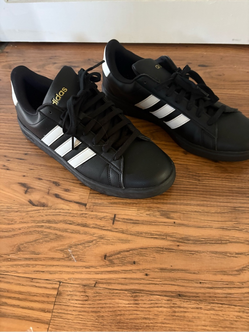 Adidas Black Sneakers with White 3-Stripes